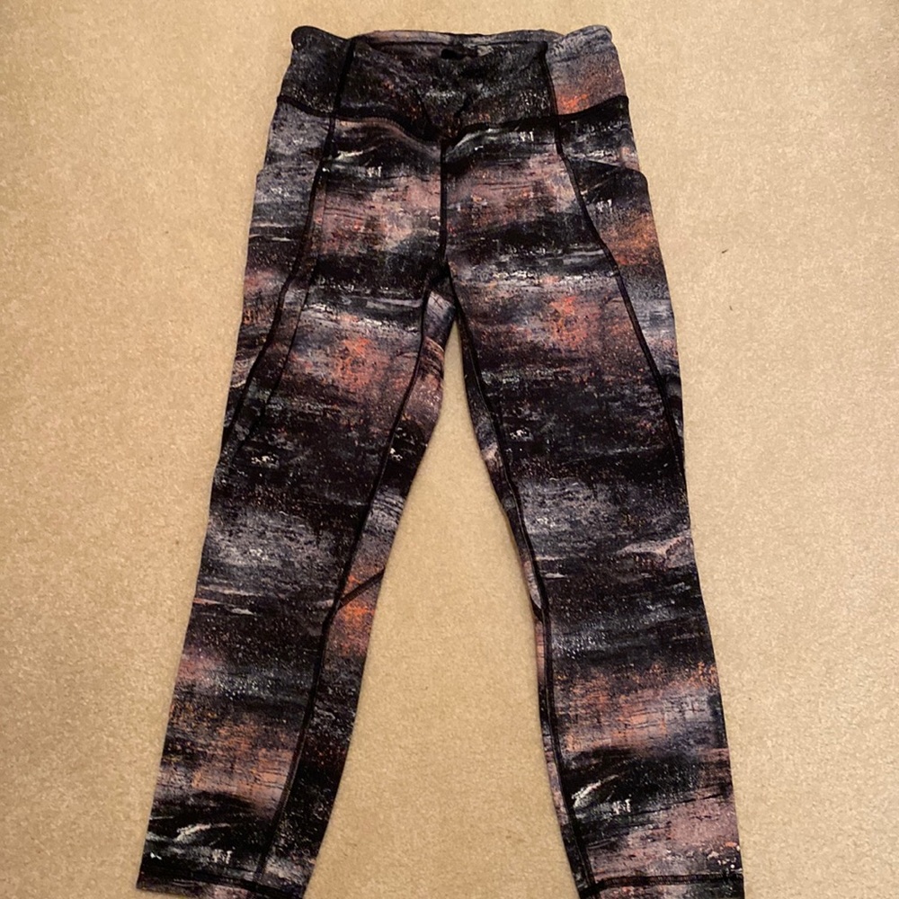 LULULEMON leggings. Black and pink. Size 8. Great condition.